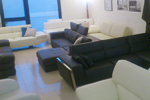 Divani angolari in pelle nero e bianco
